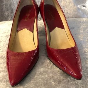 Michael Korda red patent croc pumps